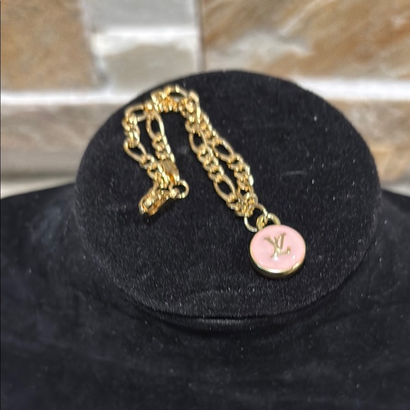Authentic LV Gold and Pink pendant bracelet - Picture 1 of 4